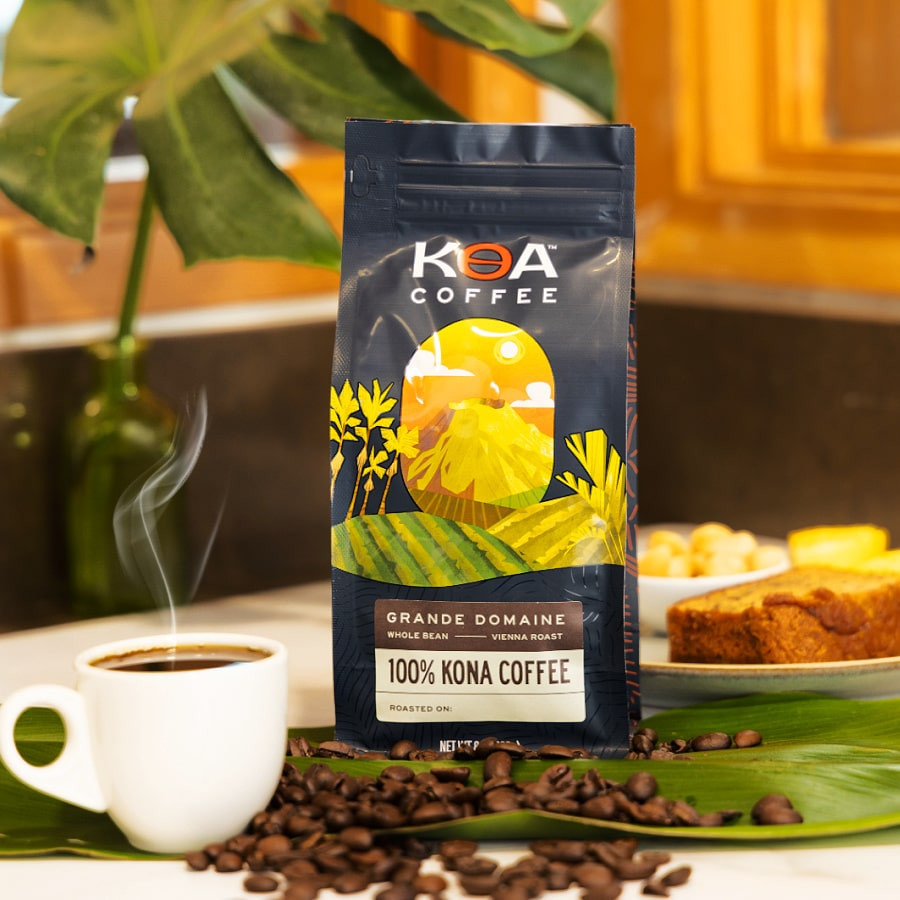 Koa Coffee Grande Domaine bag beside a cup