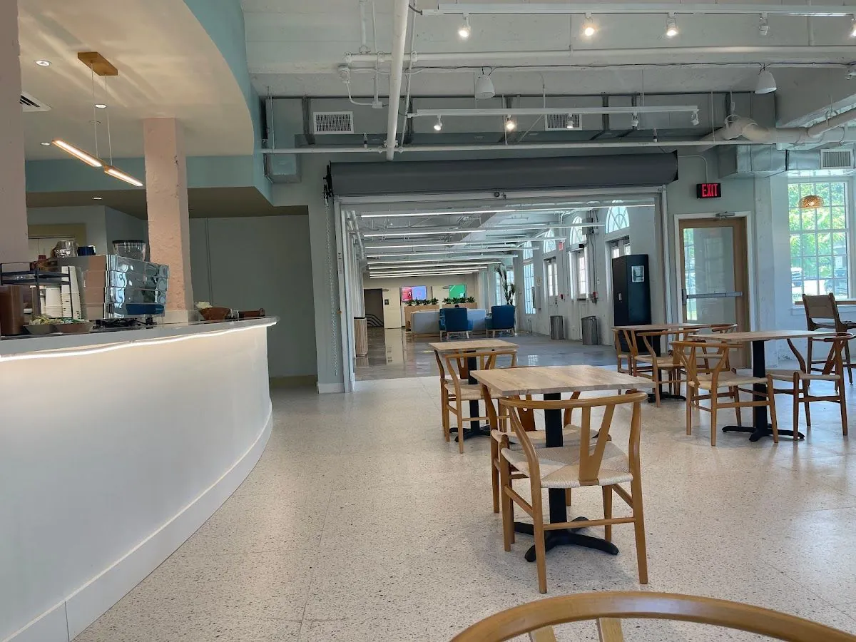 Seating and the coffee counter inside Island Brew Coffeehouse Manoa
