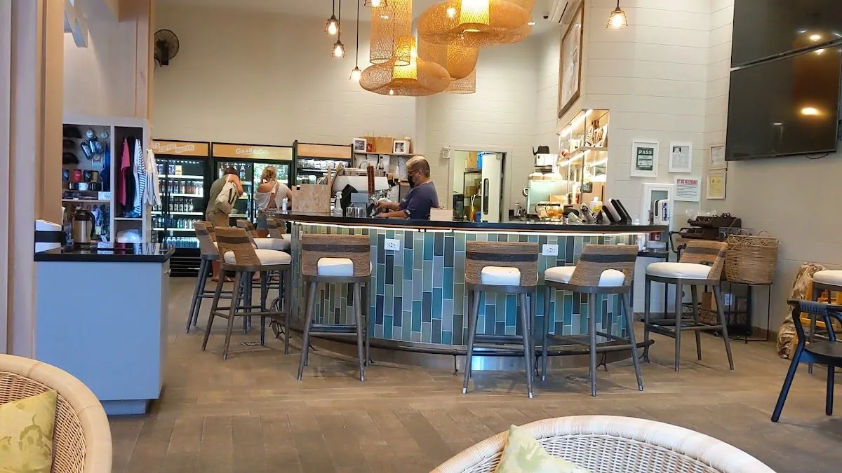 The café counter, stools, and chairs at Knots Coffee Roasters in Queen Kapiolani Hotel